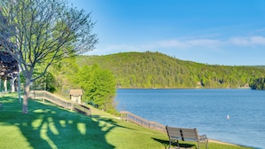 A lakeside park with a bench, a wooden walkway, and a small building. - Close to Marina, Beach & Town! Schroon Lake Escape (Schroon Lake)