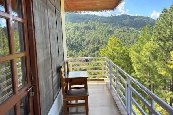 Family Room, Garden View | Property grounds