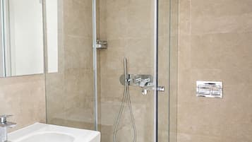 Shower, free toiletries, hair dryer, towels
