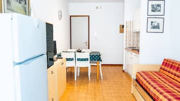 Apartamento, 2 quartos, terraço | Área de estar