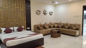 Luxury Studio Suite, Balcony, City View | Desk, laptop workspace, iron/ironing board, free WiFi