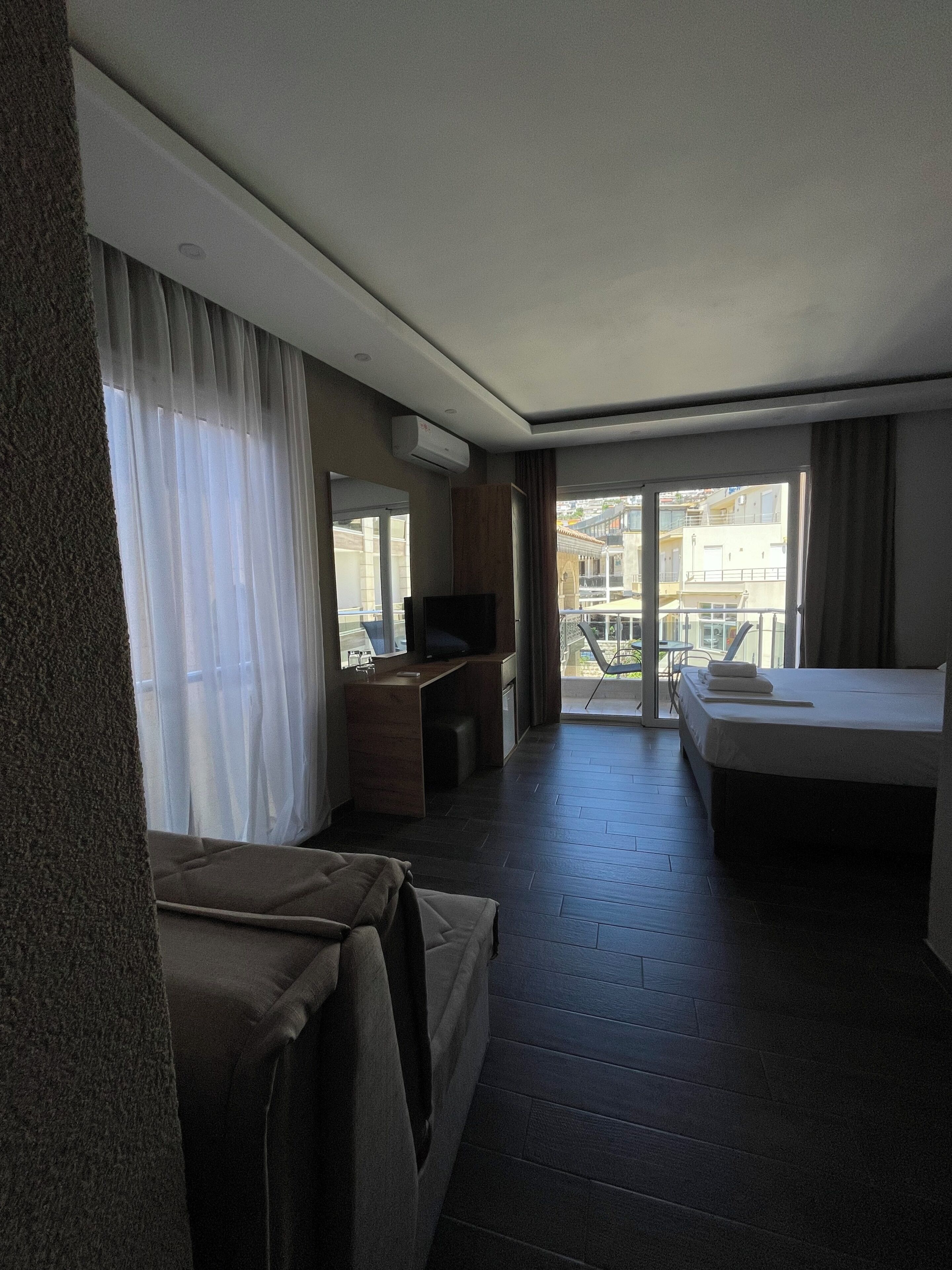 Triple Room, City View | Desk, free WiFi, bed sheets, wheelchair access