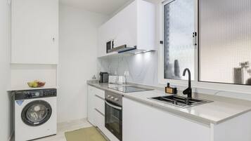Mini-fridge, microwave, oven, stovetop