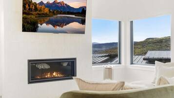 Smart TV, fireplace, foosball