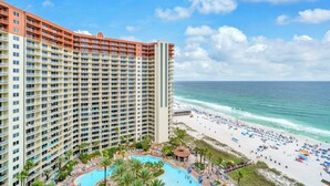 A high-rise hotel with a pool, beach, and ocean view. - 🌊Beachfront Complex~Large Lagoon Pool~Shores of Panama 1509🌊 (Panama City Beach)