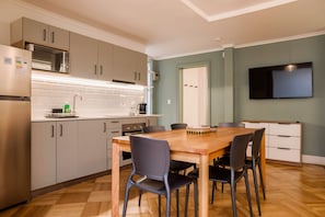 Apartment, 2 Bedrooms | Private kitchen | Full-size fridge, microwave, oven, stovetop - Terranova Apartments by Andes STR (Providencia)