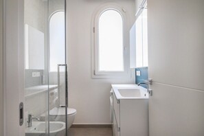 Hair dryer, bidet, towels, soap