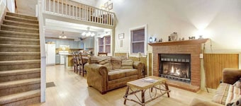 Quiet dog-friendly riverfront house with large back deck, hot tub, fireplace