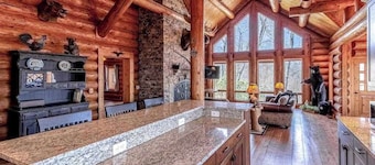 Mountain-view log home with hot tub, firepits, pool table & air hockey