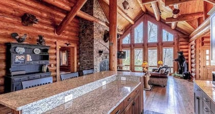 Mountain-view log home with hot tub, firepits, pool table & air hockey