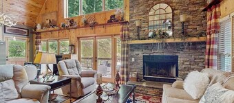 Cozy waterfront home w/hot tub, swing, firepit, and fireplace