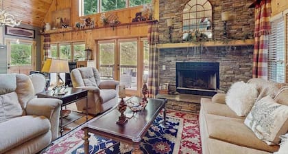 Cozy waterfront home w/hot tub, swing, firepit, and fireplace