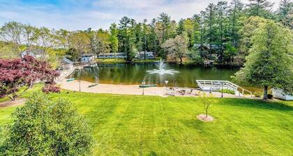 Lakefront corner condo with canoes, resort pool, tennis & firepit - dogs welcome