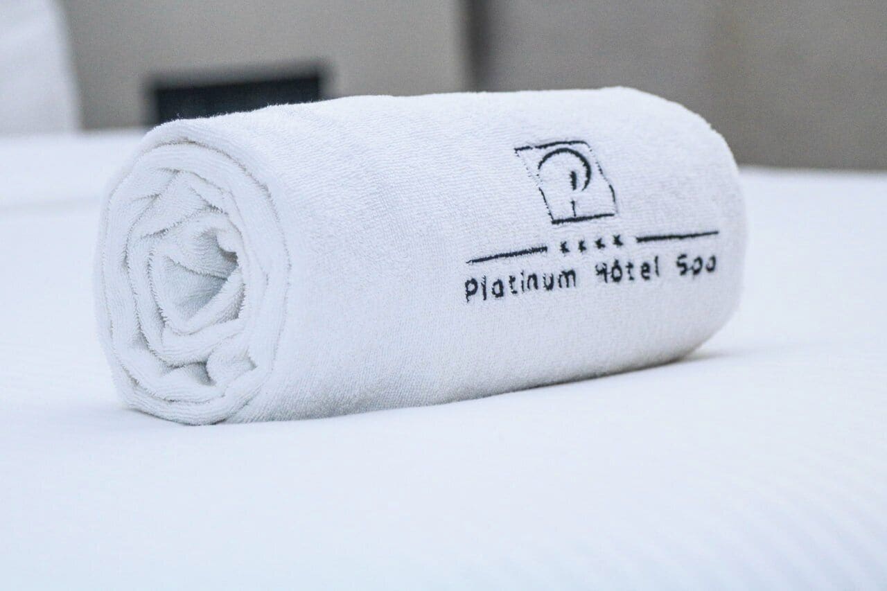 Separate tub and shower, slippers, towels, soap