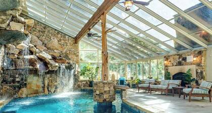 Riverside opulence with game room, private heated pool, hot tub & firepit