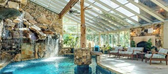 Riverside opulence with game room, private heated pool, hot tub & firepit