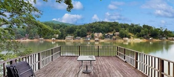 Lakefront cabin at Lake Lure with grill, boathouse, dock & porch