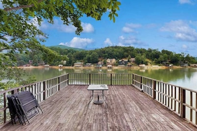 Lakefront cabin at Lake Lure with grill, boathouse, dock & porch