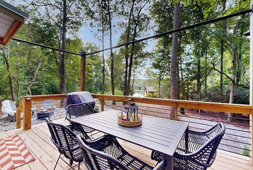 Lakeview tiny home with a loft, full kitchen, furnished deck, & firepit