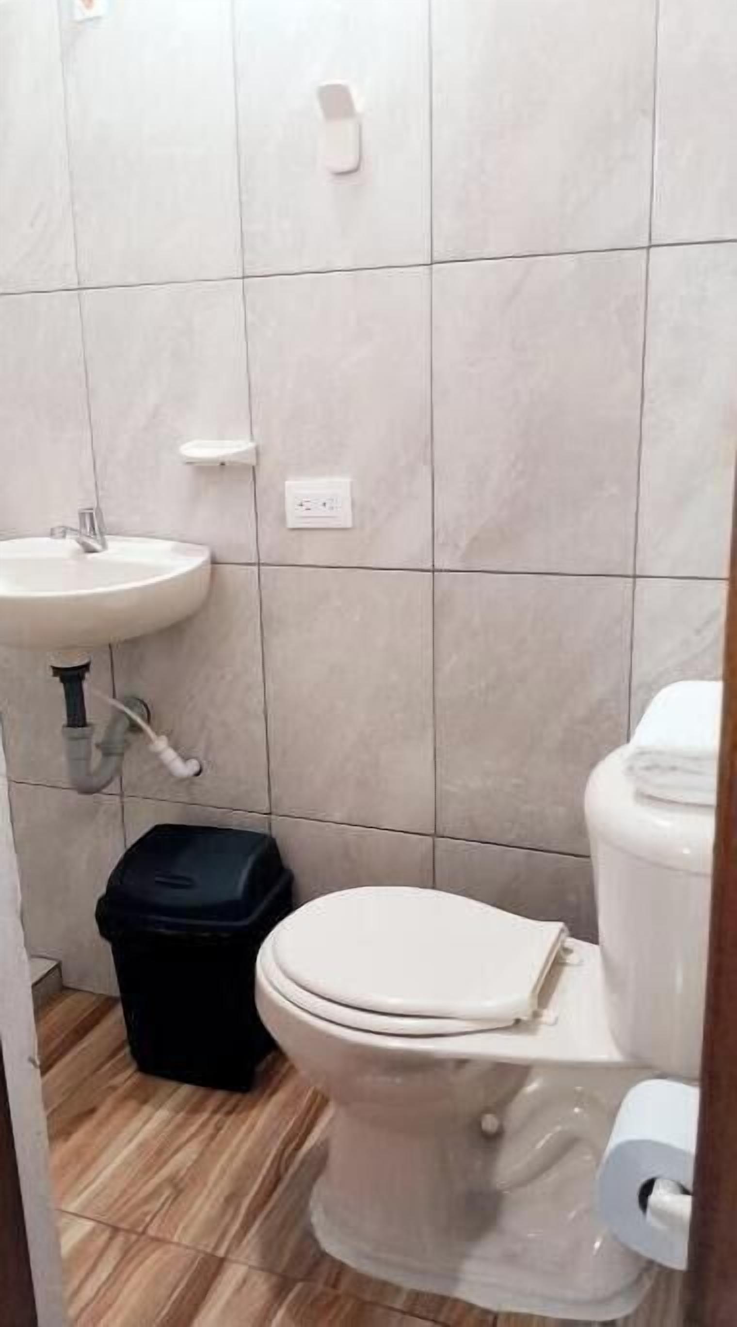 Shower, towels, soap, toilet paper