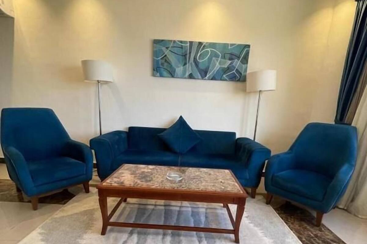 Suite de lujo, vista al mar | Área de sala de estar