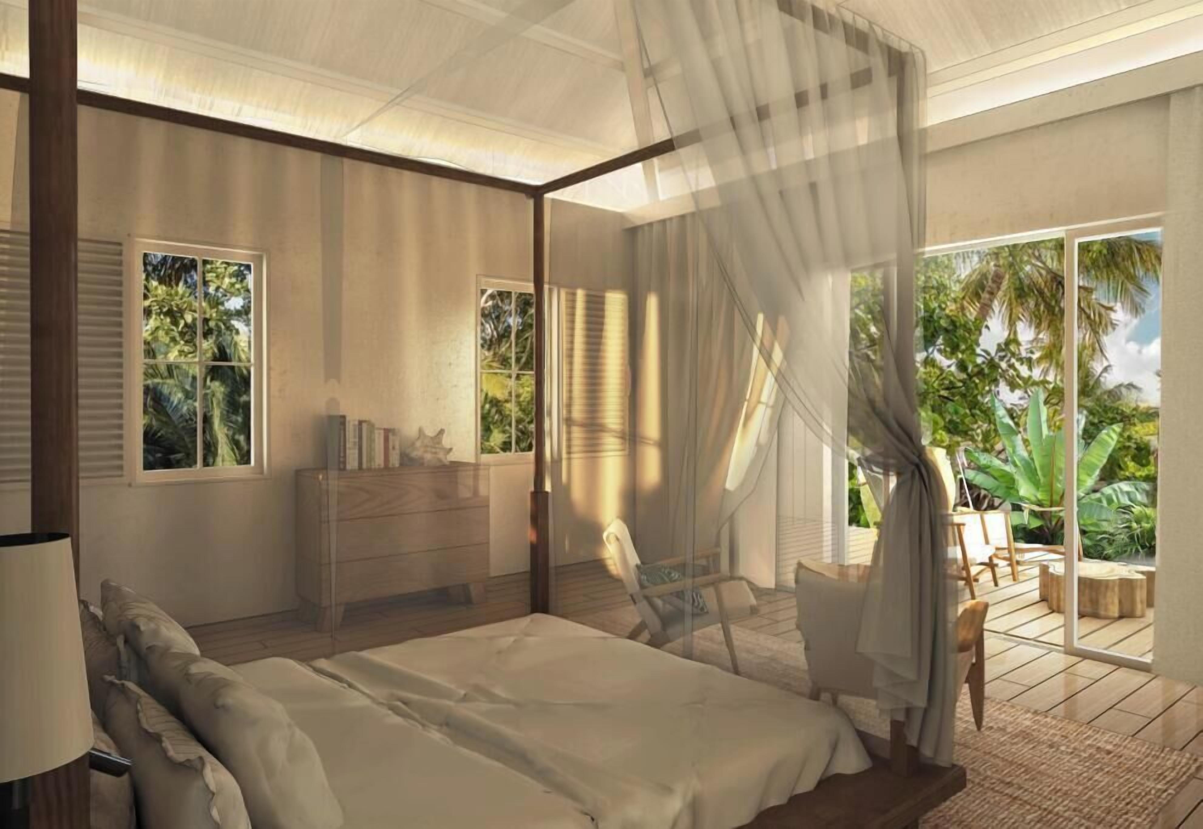 A bedroom with a canopy bed, a wooden dresser, and a view of a tropical garden.