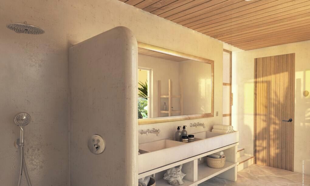 A bathroom with a shower, a sink with a mirror, and a wooden door.