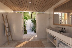 Villa 1  | Badkamer | Een douche, gratis toiletartikelen, een haardroger, pantoffels