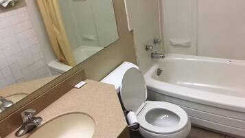 Room, 1 King Bed, Smoking | Bathroom | Free toiletries, towels