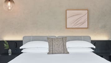 Premium bedding, down comforters, Select Comfort beds, minibar