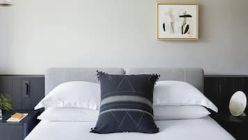 Premium bedding, down comforters, Select Comfort beds, minibar