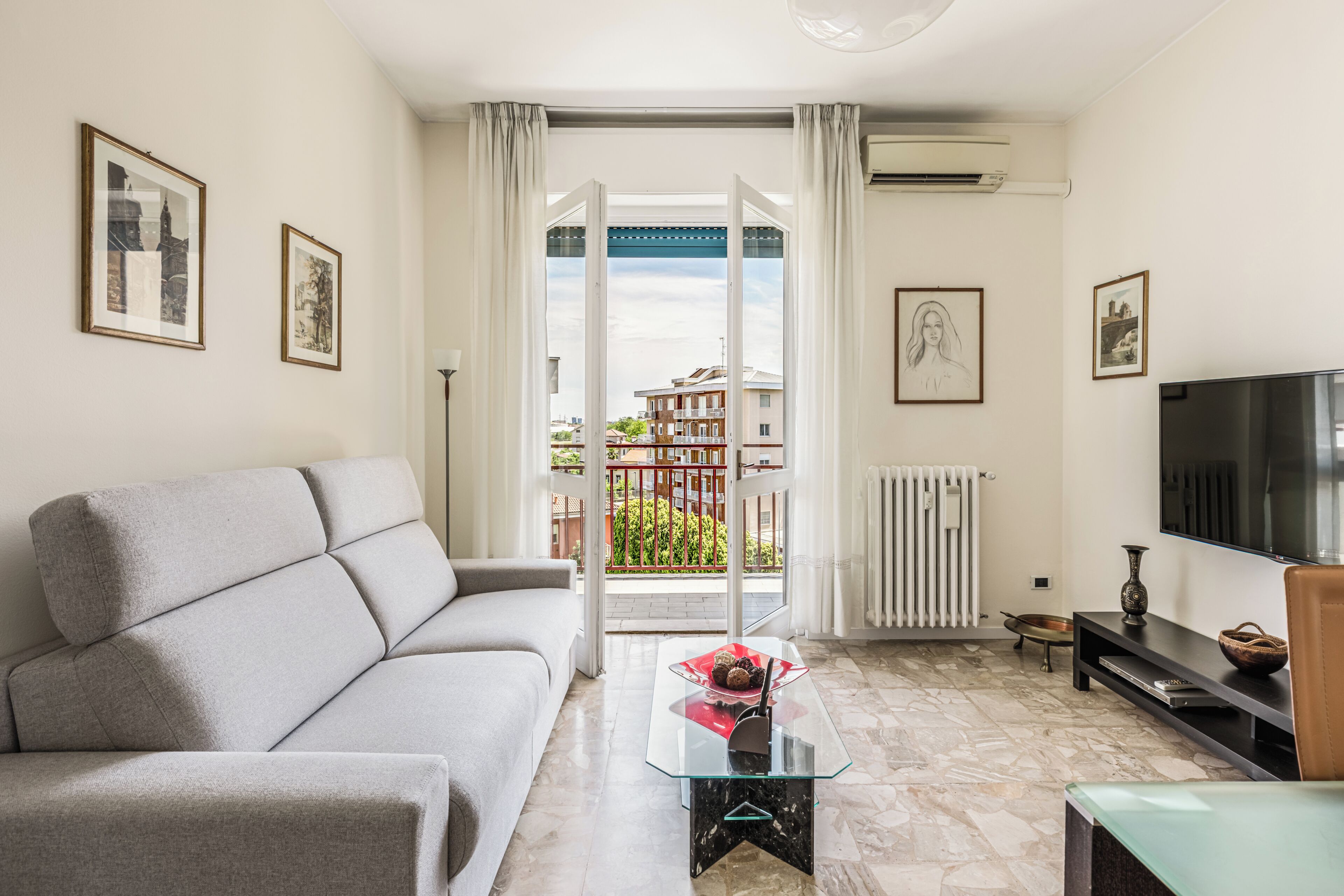 Apartamento, balcón | Zona de estar