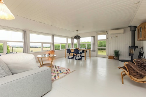 Black timber house with sea view in Karrebæksminde