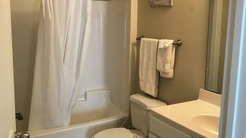 Hair dryer, towels, soap, toilet paper