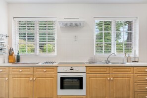 Fridge, microwave, toaster, cookware/dishes/utensils