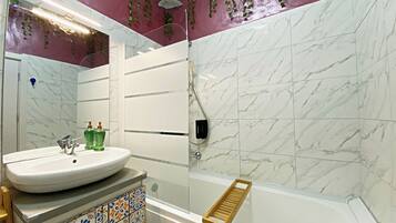 Hair dryer, towels, soap, toilet paper