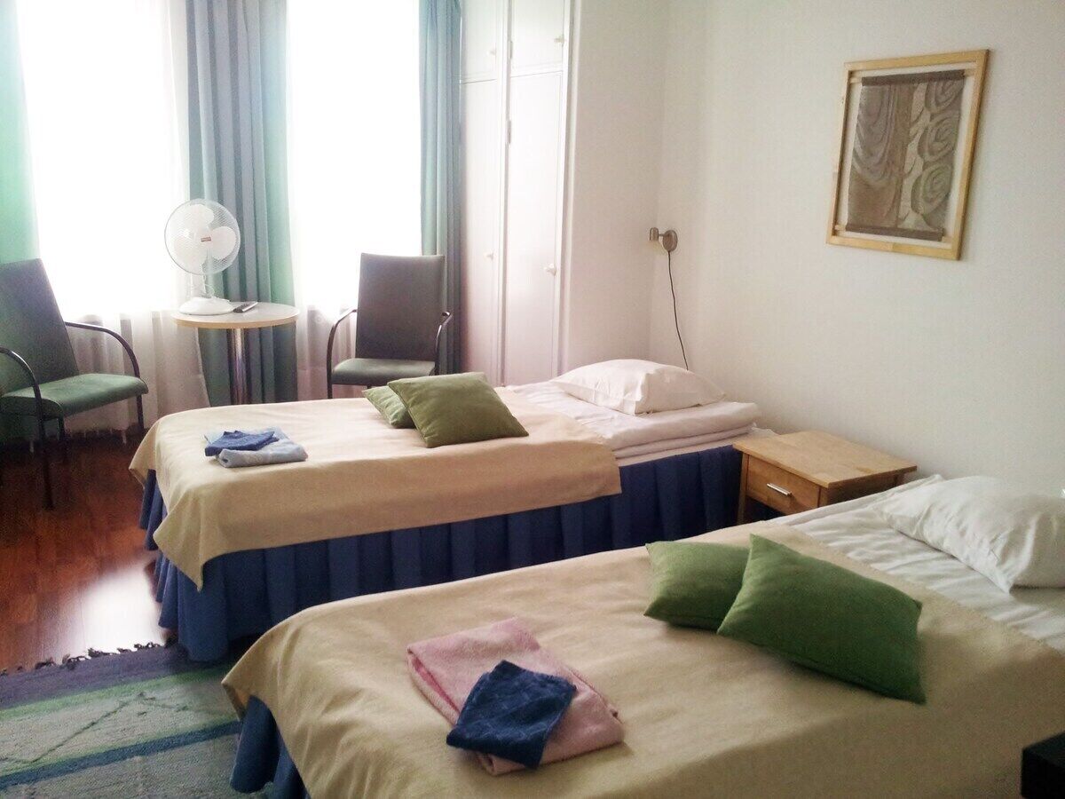 Doppel- oder Zweibettzimmer