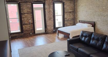 Lovely 2nd floor apartment with private rooftop deck near the river on S Main