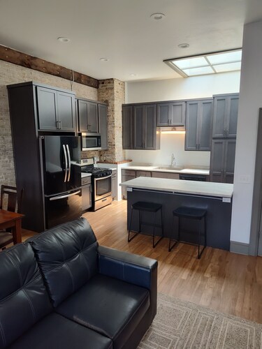 Lovely 2nd floor apartment with private rooftop deck near the river on S Main