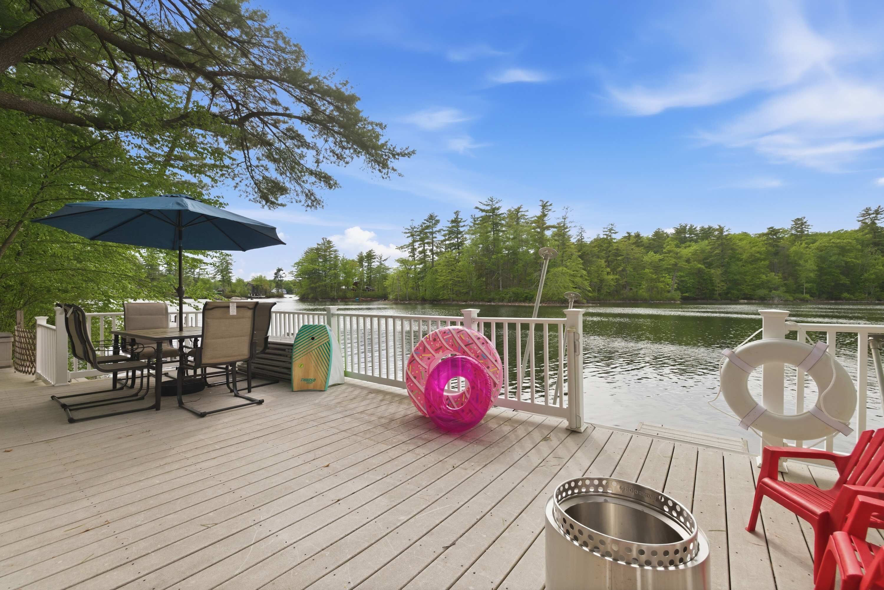 Enjoy direct waterfront views from the expansive dockside deck and outdoor dining area.