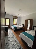 Standard Triple Room, Balcony, River View | In-room safe, free WiFi
