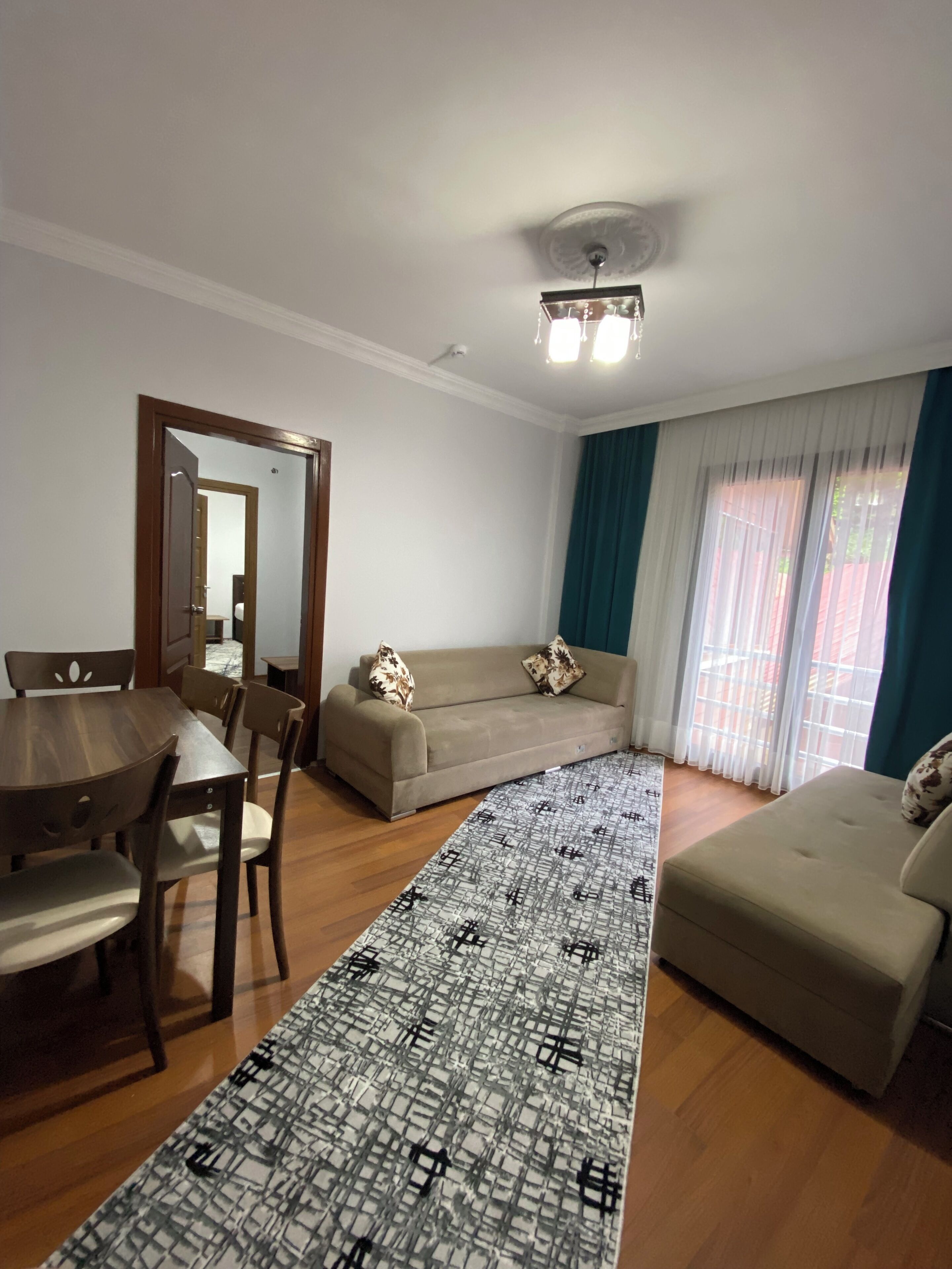 Suite monolocale, vista montagna | Area soggiorno