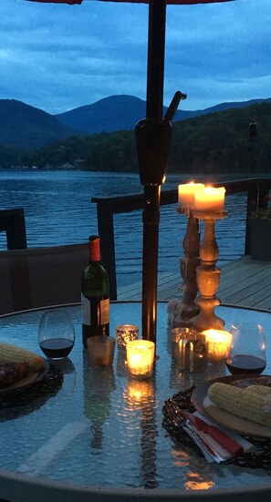 Outdoor dining - The Red. Amazing lakefront retreat with BIG views, big decks, and a 'Lake Pool'! (Lake Lure)