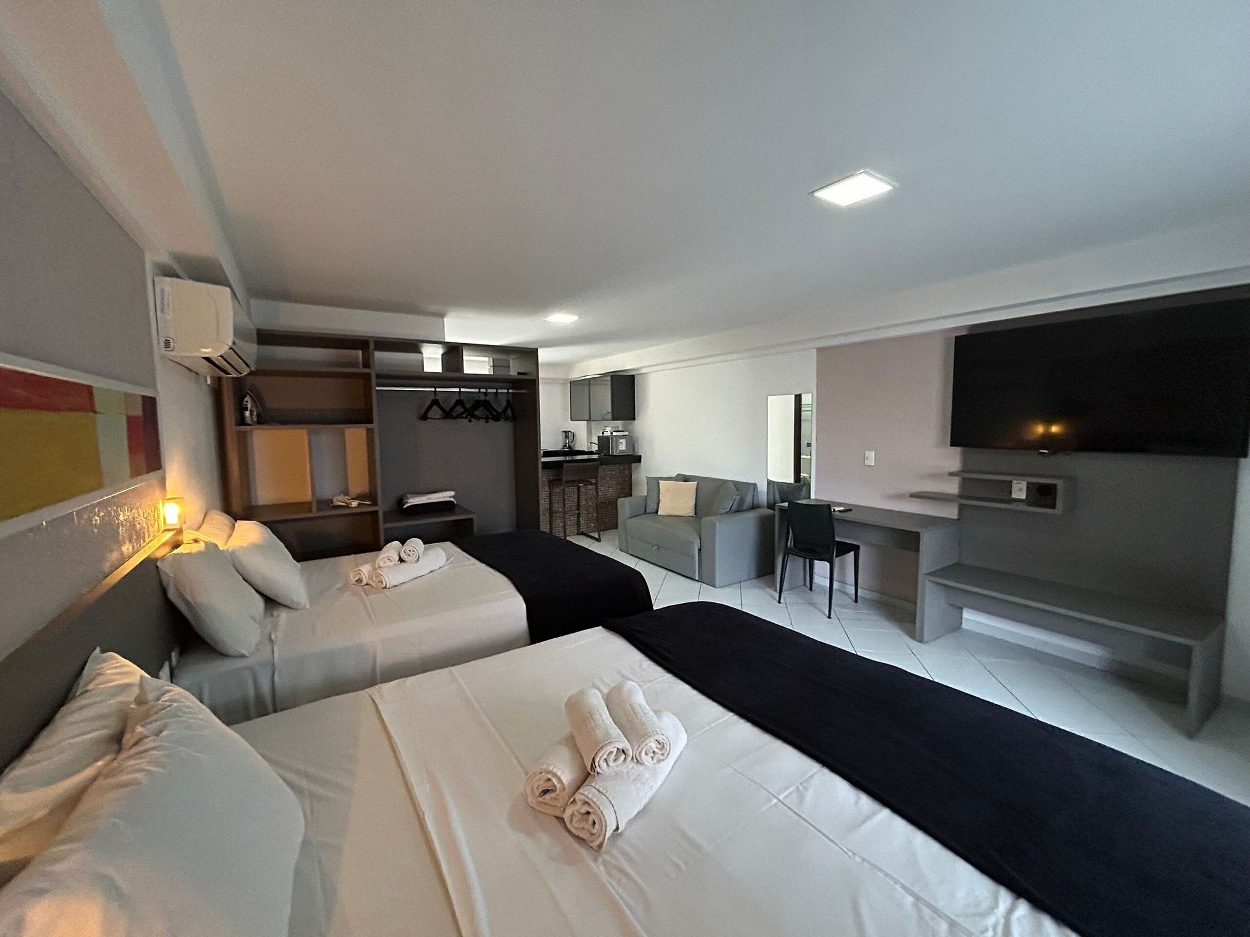 Family Apartment | Blackout drapes, cribs (surcharge), WiFi (free), bed sheets