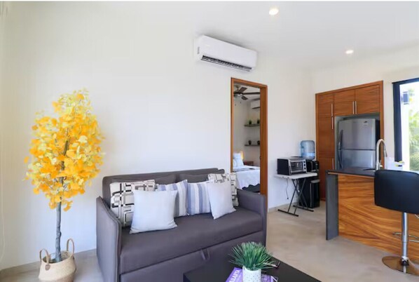 Living area - Ground Level 2BD Villa w/Pool, garden + fast Wi-Fi (Flamingos)