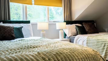 4 habitaciones, tabla de planchar con plancha, wifi y ropa de cama