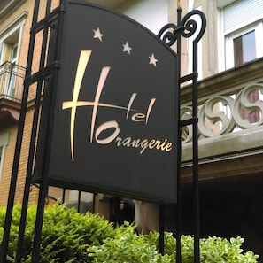 A hotel sign with the name 'Hotel Rangerie' and decorative stars. - Hotel De L Orangerie (Strasbourg)