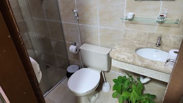 Bathroom | Hair dryer, towels, soap, toilet paper