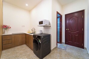 Family Quadruple Room | Private kitchen - The Pivot Suite Ben Thanh - District 1 (Ben Thanh)