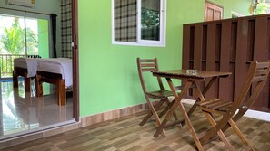 Standard Twin Room, Lanai, Garden View | Blackout curtains, free WiFi - Naisang Hostel (Mueng)